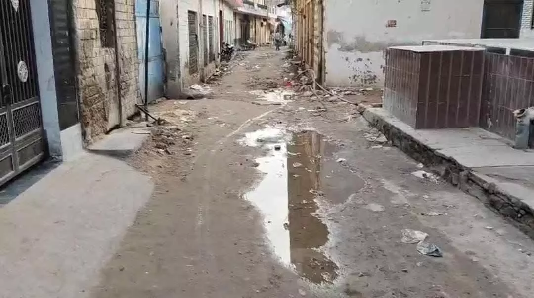 A broken road after sewerage work in Mehandipur Balajis New Adarsh Colony has become a source of trouble. A broken road after sewerage work in Mehandipur Balajis New Adarsh Colony has become a source of trouble.