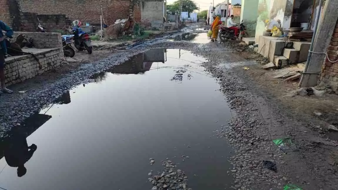 The dilapidated road in Bhavanpura village The dilapidated road in Bhavanpura village