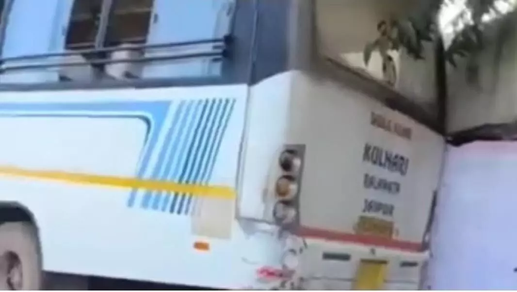 A private school bus narrowly escapes overturning in Karauli