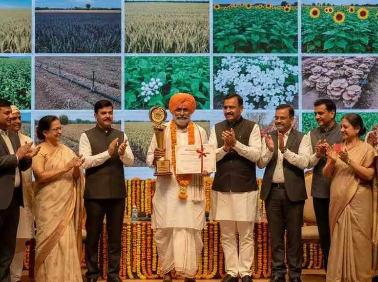 Santosh Swami receives the Millionaire Farmer of India award
