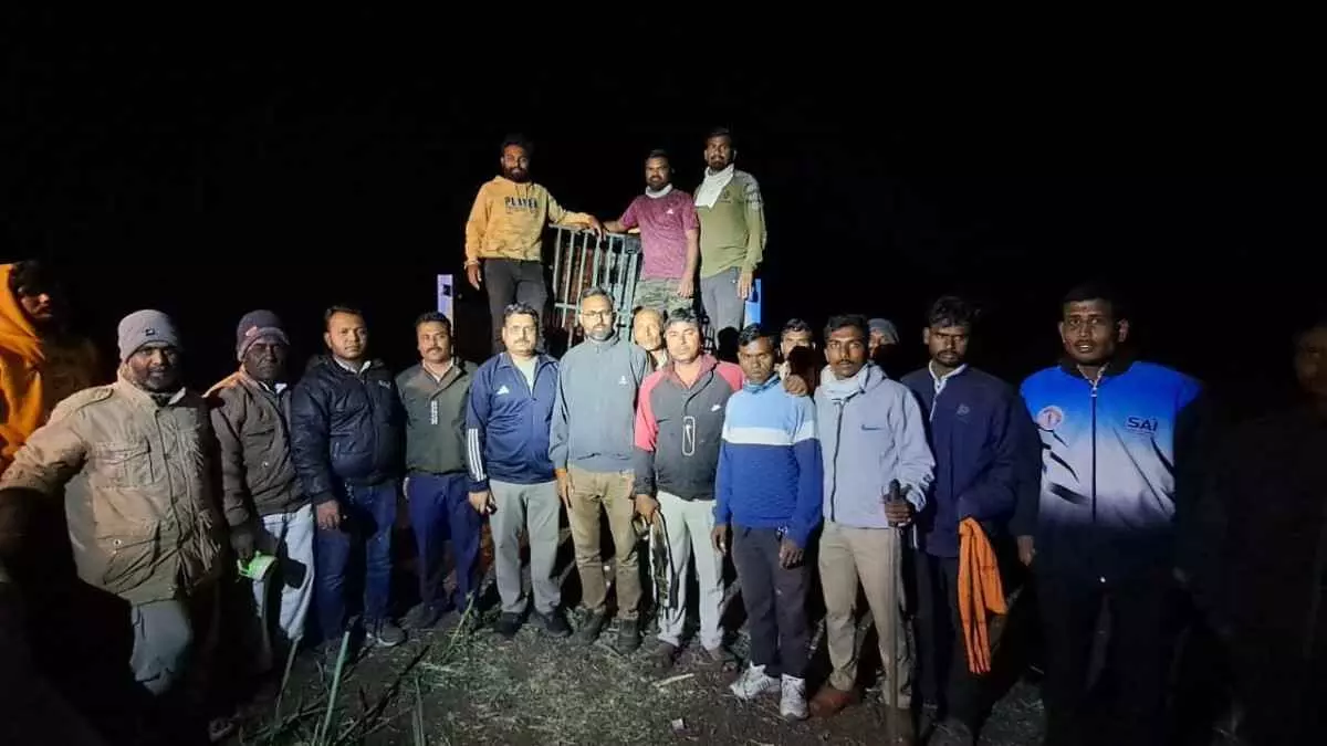 A leopard trapped in a dry well in Shirpur was saved by the forest department after an 11-hour rescue operation. A leopard trapped in a dry well in Shirpur was saved by the forest department after an 11-hour rescue operation.