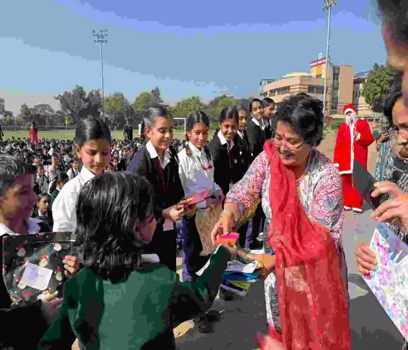 The “Joy of Giving” program at Dharav High School brought a wave of happiness to the faces of the children. The “Joy of Giving” program at Dharav High School brought a wave of happiness to the faces of the children.