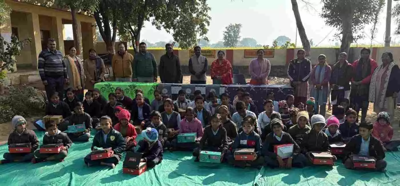 80 pairs of shoes and socks distributed to needy students of Nagla Manjhi 80 pairs of shoes and socks distributed to needy students of Nagla Manjhi