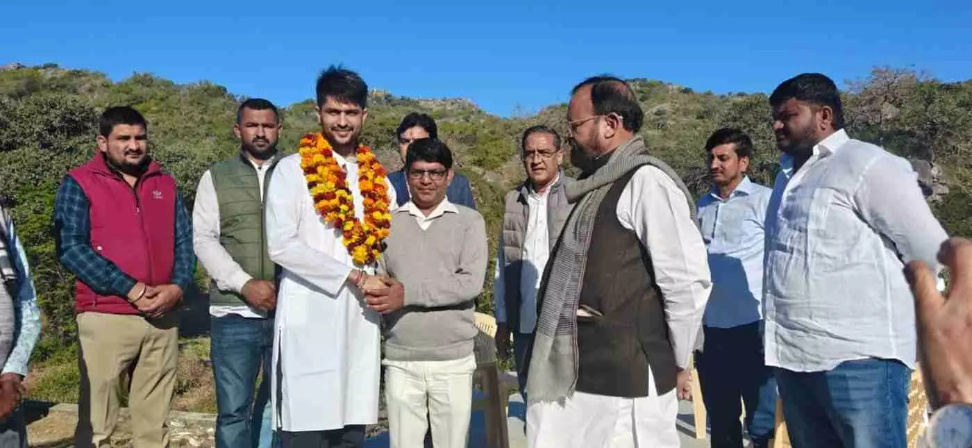 youth leader Nirmal Chaudhary setting out on foot. youth leader Nirmal Chaudhary setting out on foot.