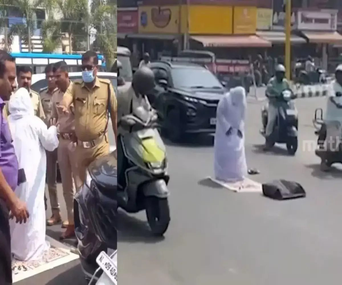 Womans prayer protest at busy Kerala intersection
