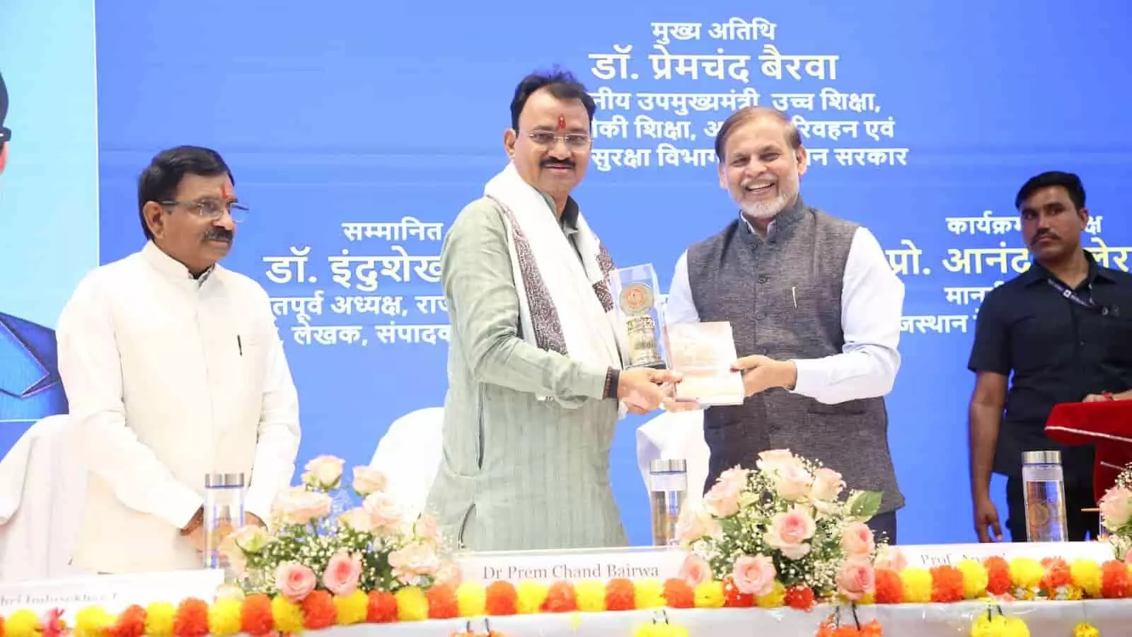 राजस्थान केंद्रीय विश्वविद्यालय में उपमुख्यमंत्री डॉ. प्रेम चंद बैरवा अंबेडकर जयंती समारोह के दौरान दीप प्रज्वलन करते हुए।