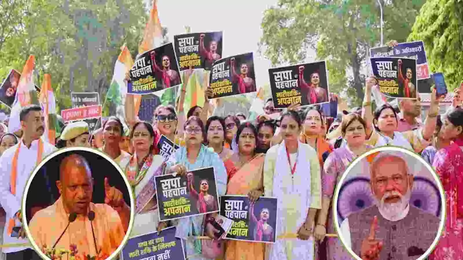 हाथों में सपा के विरोध वाले पोस्टर लिए भाजपा महिला कार्यकर्ता लखनऊ की सड़कों पर प्रदर्शन कर रही हैं। हाथों में सपा के विरोध वाले पोस्टर लिए भाजपा महिला कार्यकर्ता लखनऊ की सड़कों पर प्रदर्शन कर रही हैं।
