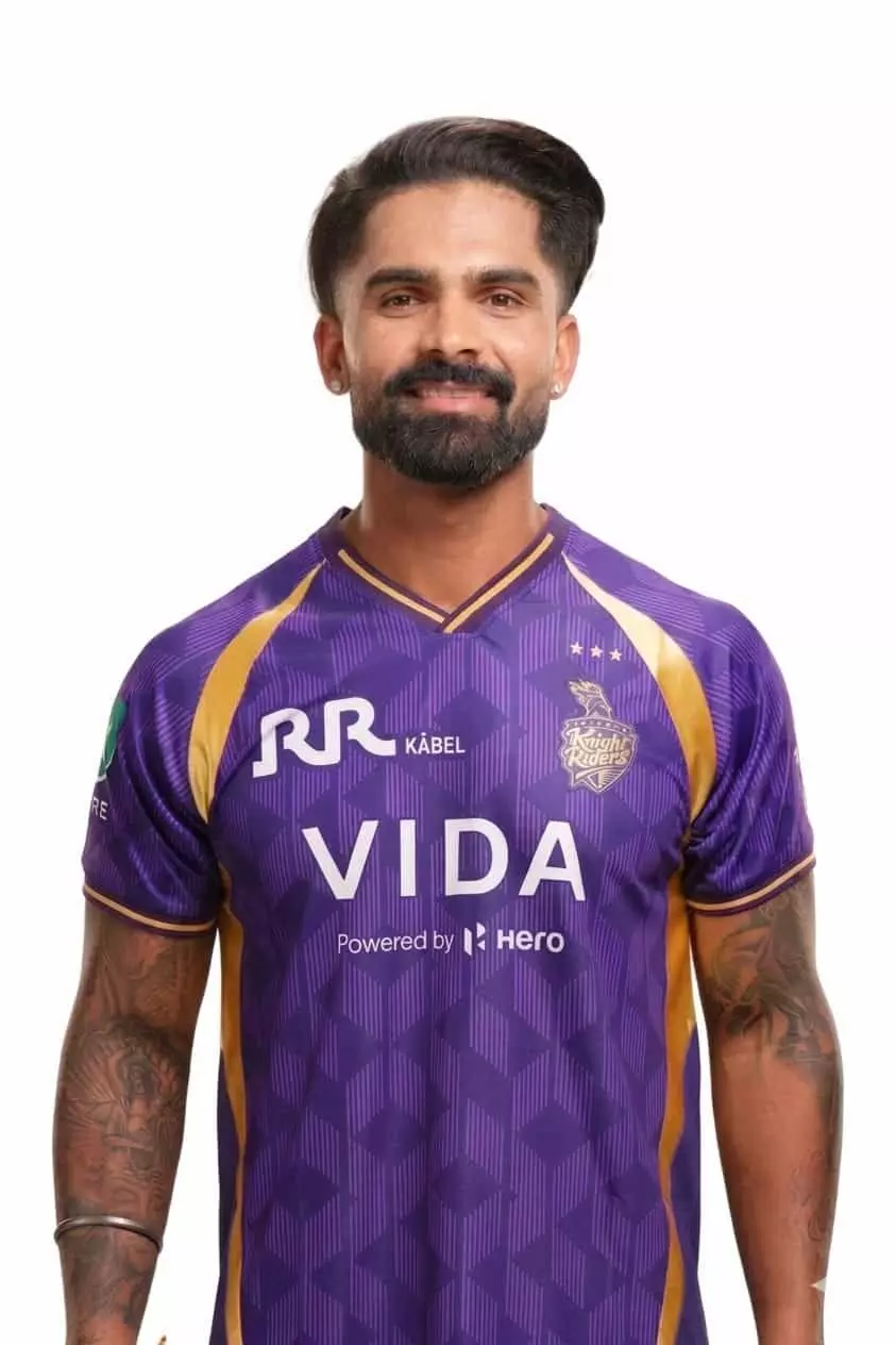 केकेआर की बैंगनी जर्सी पहने हुए क्रिकेटर सार्थक रंजन का एआई द्वारा निर्मित चित्र। Image generated by AI for illustrative purposes. केकेआर की बैंगनी जर्सी पहने हुए क्रिकेटर सार्थक रंजन का एआई द्वारा निर्मित चित्र। Image generated by AI for illustrative purposes.