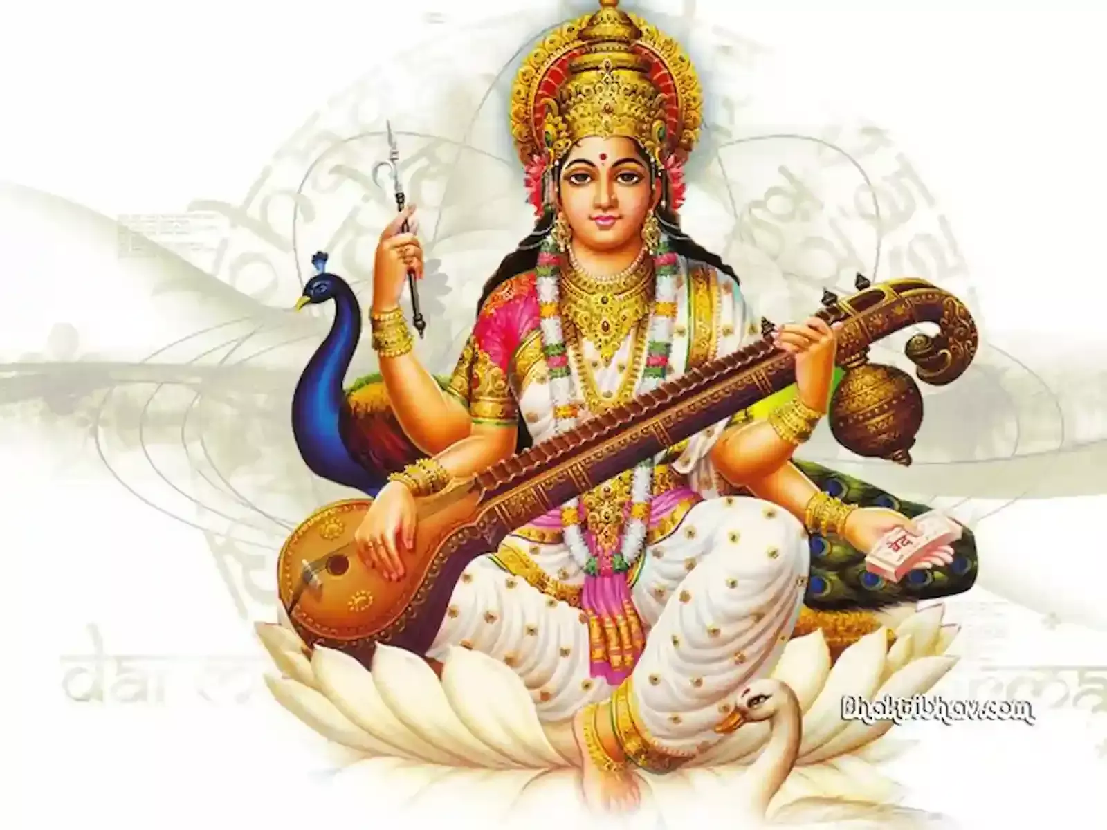 धवल वस्त्र धारण किए हुए कमल पर विराजमान मां सरस्वती की मूर्ति जिसमें वे वीणा और पुस्तक धारण किए हुए हैं। धवल वस्त्र धारण किए हुए कमल पर विराजमान मां सरस्वती की मूर्ति जिसमें वे वीणा और पुस्तक धारण किए हुए हैं।