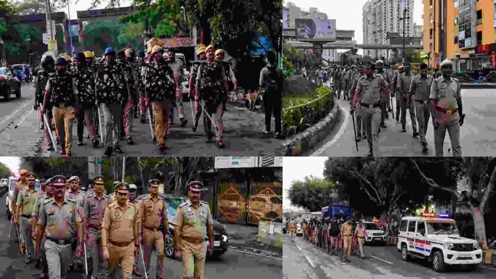 नोएडा की सड़क पर पुलिस बल और अधिकारी पैदल गश्त करते हुए सुरक्षा व्यवस्था का जायजा ले रहे हैं।