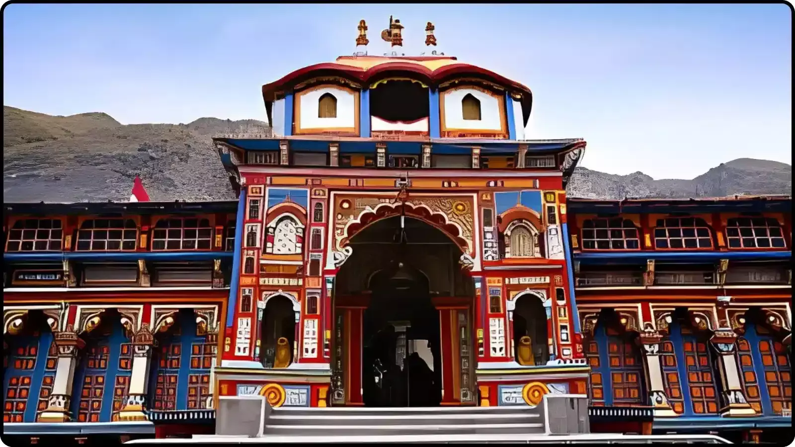 बद्रीनाथ धाम का रंगीन मुख्य मंदिर प्रवेश द्वार और पीछे पहाड़ों का दृश्य। बद्रीनाथ धाम का रंगीन मुख्य मंदिर प्रवेश द्वार और पीछे पहाड़ों का दृश्य।