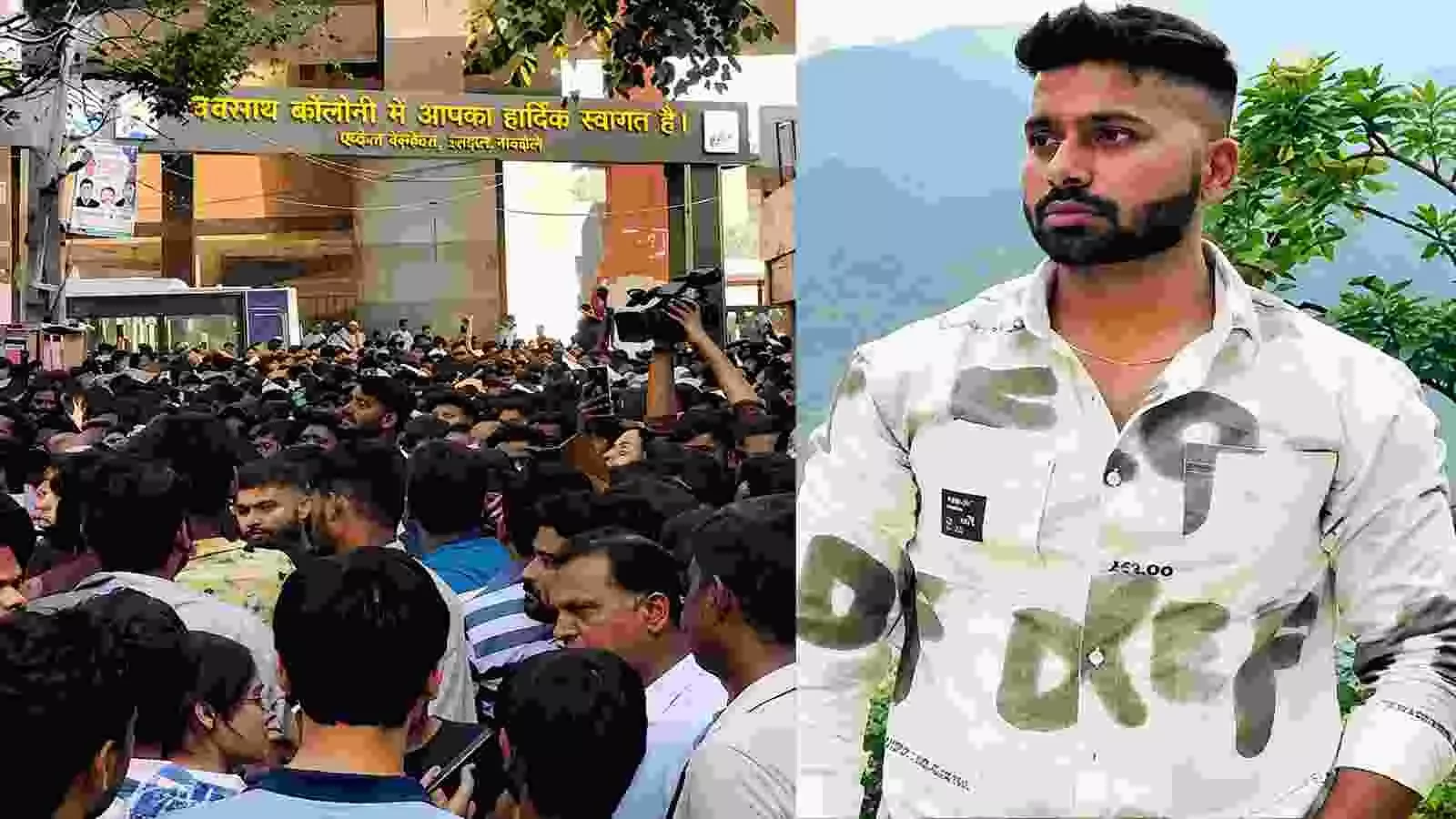 भारी भीड़ और तरुण बुतोलिया का चित्र उत्तम नगर में हत्या के विरोध के संदर्भ में। भारी भीड़ और तरुण बुतोलिया का चित्र उत्तम नगर में हत्या के विरोध के संदर्भ में।