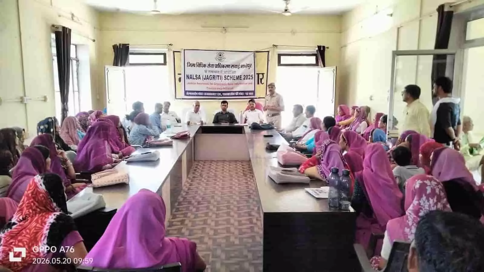 सवाई माधोपुर के खण्डार में विधिक जागरूकता कार्यक्रम के दौरान उपस्थित अधिकारी और महिलाएं।