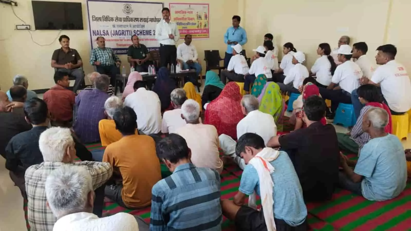सवाई माधोपुर के मुख्यमंत्री पुनर्वास गृह में वृद्धजन जागरूकता कार्यक्रम के दौरान मंच पर बैठे अतिथि और विधिक सेवा अधिकारी। सवाई माधोपुर के मुख्यमंत्री पुनर्वास गृह में वृद्धजन जागरूकता कार्यक्रम के दौरान मंच पर बैठे अतिथि और विधिक सेवा अधिकारी।