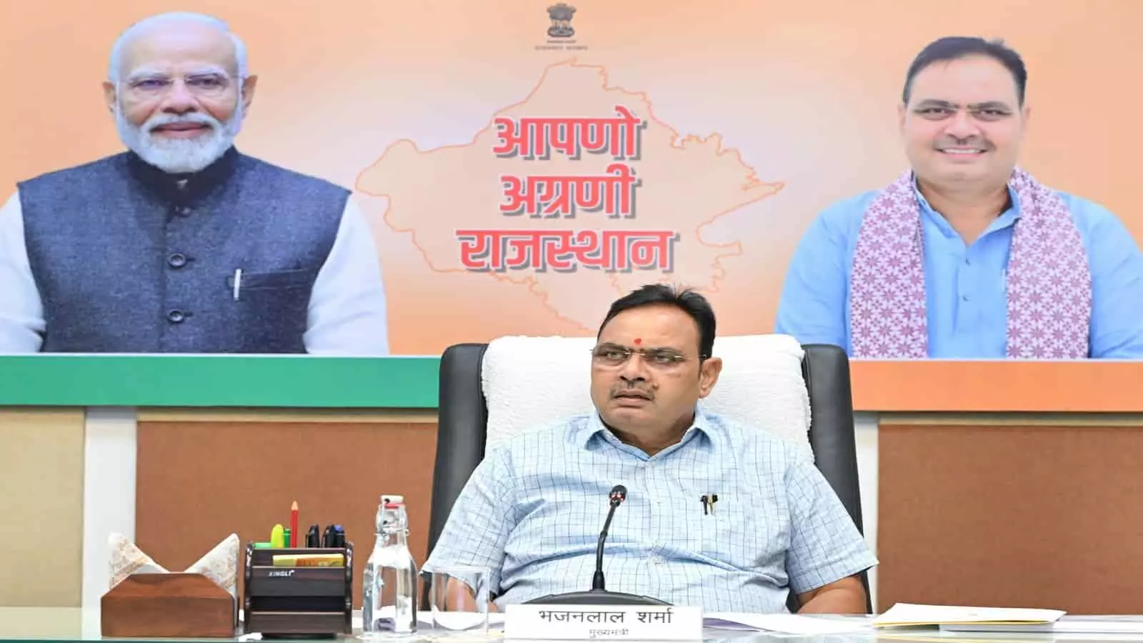 : मुख्यमंत्री भजनलाल शर्मा बैठक में संबोधित करते हुए और पीछे सरकारी पोस्टर लगा है। : मुख्यमंत्री भजनलाल शर्मा बैठक में संबोधित करते हुए और पीछे सरकारी पोस्टर लगा है।