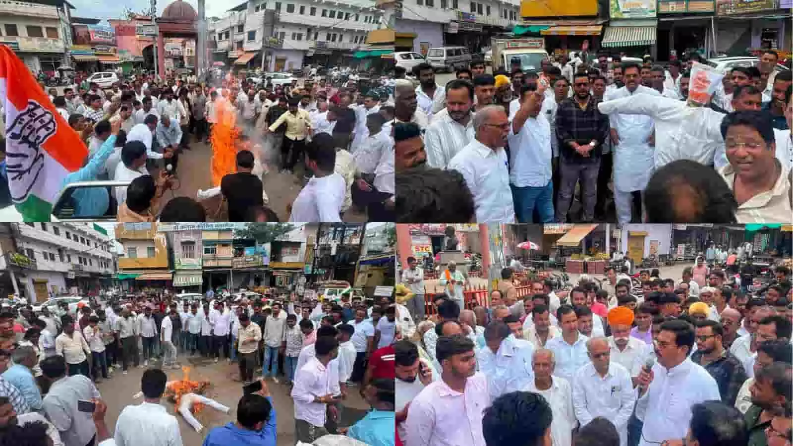 तस्वीर में गांधी चौराहे पर जुटे कांग्रेस कार्यकर्ता पुतला फूंकाते और प्रदर्शन करते दिख रहे हैं।