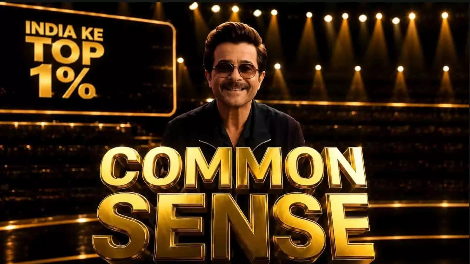 तस्वीर में अभिनेता अनिल कपूर मंच पर India Ke Top 1% और COMMON SENSE के लोगो के साथ नजर आ रहे हैं। तस्वीर में अभिनेता अनिल कपूर मंच पर India Ke Top 1% और COMMON SENSE के लोगो के साथ नजर आ रहे हैं।