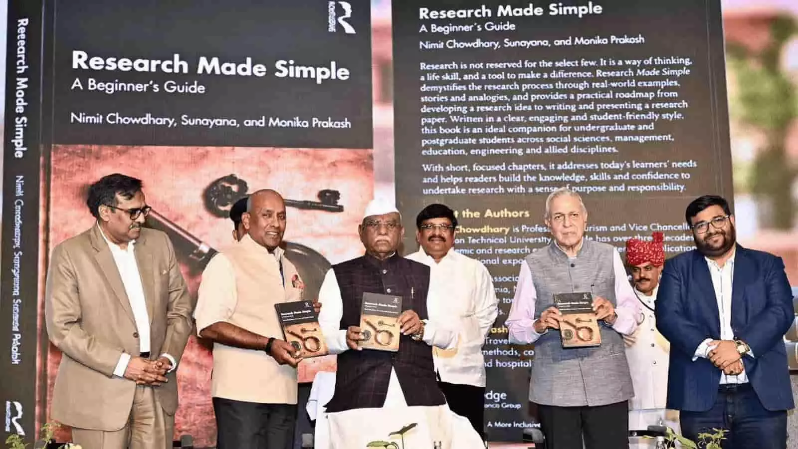 तस्वीर में जयपुर में रिसर्च मेड सिंपल पुस्तक के विमोचन अवसर पर राज्यपाल हरिभाऊ बागडे, प्रो. निमित चौधरी और अन्य गणमान्य लोग। तस्वीर में जयपुर में रिसर्च मेड सिंपल पुस्तक के विमोचन अवसर पर राज्यपाल हरिभाऊ बागडे, प्रो. निमित चौधरी और अन्य गणमान्य लोग।