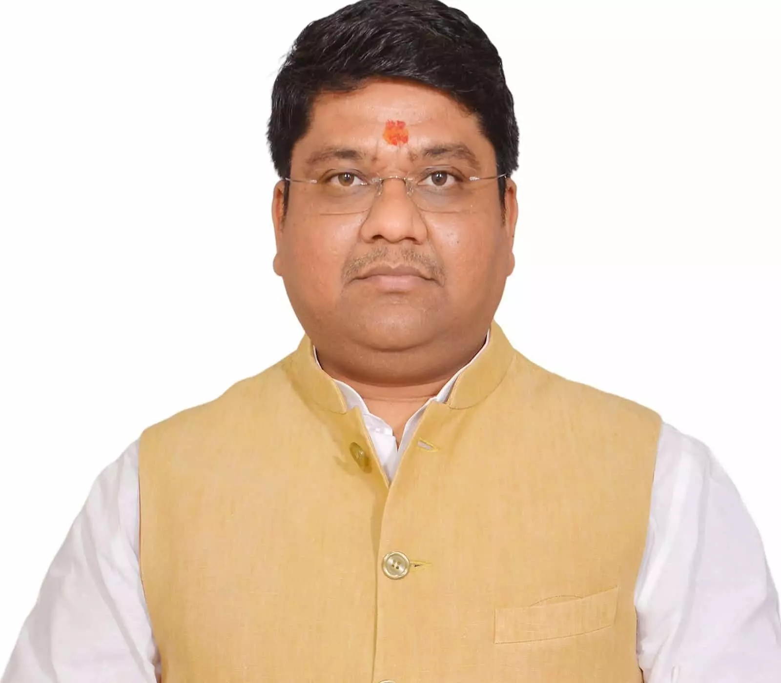 सफेद पृष्ठभूमि के सामने चश्मा और तिलक लगाए खड़े अभिषेक कृष्ण दुबे की तस्वीर। सफेद पृष्ठभूमि के सामने चश्मा और तिलक लगाए खड़े अभिषेक कृष्ण दुबे की तस्वीर।