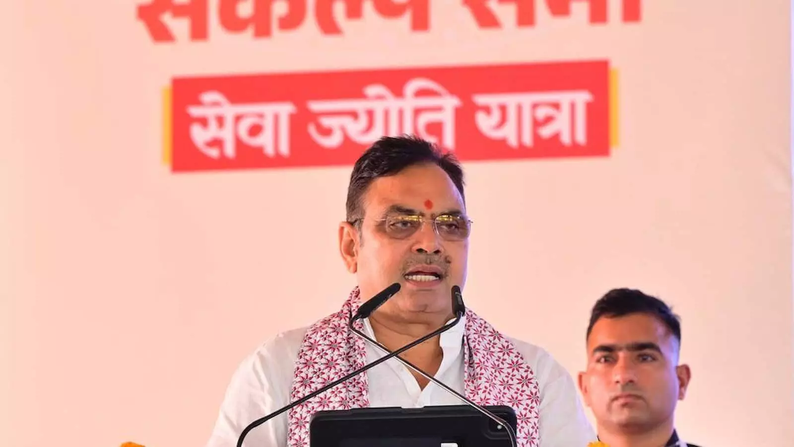 तस्वीर में मुख्यमंत्री भजनलाल शर्मा जयपुर में आयोजित कार्यक्रम के मंच पर माइक के सामने संबोधन देते दिख रहे हैं। तस्वीर में मुख्यमंत्री भजनलाल शर्मा जयपुर में आयोजित कार्यक्रम के मंच पर माइक के सामने संबोधन देते दिख रहे हैं।