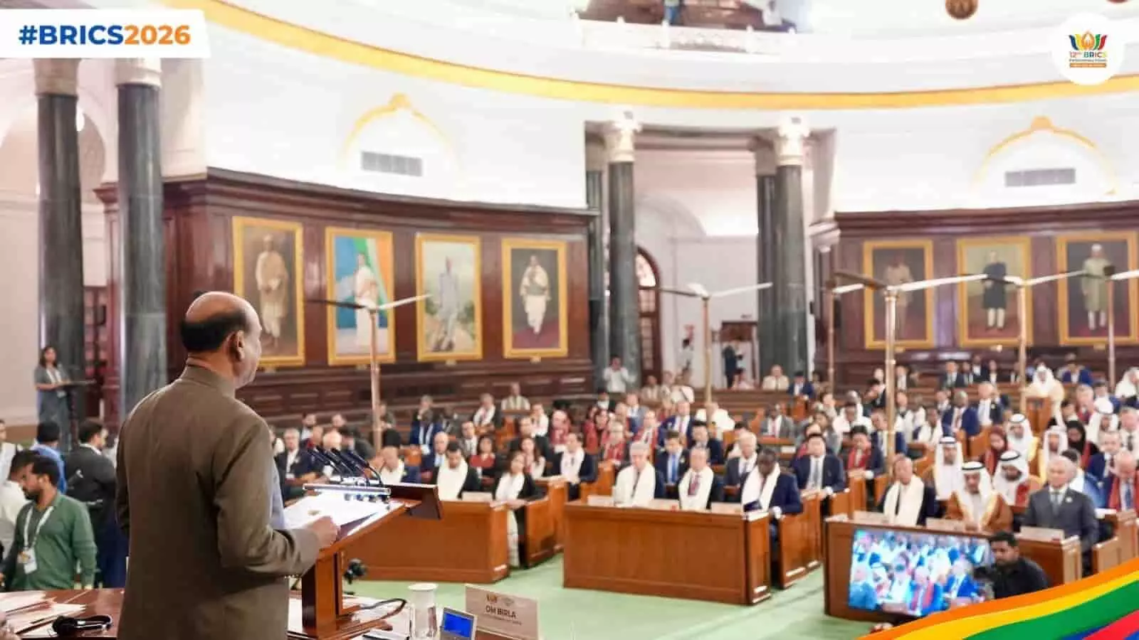 तस्वीर में लोकसभा अध्यक्ष ओम बिरला संसद भवन में 12वें ब्रिक्स संसदीय फोरम को संबोधित करते हुए।